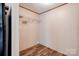 Small room featuring laminate flooring, white walls, and wire shelving at 2923-1 G B Blanton Rd, Shelby, NC 28152