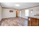 Open-concept living area featuring laminate flooring and neutral decor at 2923-1 G B Blanton Rd, Shelby, NC 28152