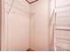 Walk-in closet featuring built in shelving for ample storage and wood look flooring at 2923-1 G B Blanton Rd, Shelby, NC 28152