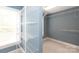 Walk-in closet with built-in shelving for clothing storage and organization at 3010 Lakewood Edge Dr, Charlotte, NC 28269