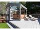 Hot tub covered with an arbor on deck with chaise lounge chairs at 3010 Lakewood Edge Dr, Charlotte, NC 28269