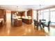 Open kitchen featuring wood cabinets, stainless appliances, and breakfast nook at 3010 Lakewood Edge Dr, Charlotte, NC 28269