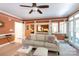 Bright living room with comfortable seating, large windows and views into the kitchen at 3010 Lakewood Edge Dr, Charlotte, NC 28269