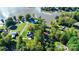 Breathtaking aerial view of waterfront home, lush trees, and serene lake access at 3915 Chevlot Hills Rd, Sherrills Ford, NC 28673