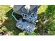 Aerial view of a home with a backyard patio, deck, and a lush green lawn at 3915 Chevlot Hills Rd, Sherrills Ford, NC 28673