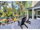 Inviting back deck with a lake view and comfortable seating, perfect for enjoying the surrounding scenery at 3915 Chevlot Hills Rd, Sherrills Ford, NC 28673