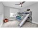 Charming bedroom features a bunk bed with a slide, perfect for a room or guest accommodations at 3915 Chevlot Hills Rd, Sherrills Ford, NC 28673