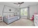Cozy bedroom features a house frame bed, natural light, and is tastefully decorated for a comfort at 3915 Chevlot Hills Rd, Sherrills Ford, NC 28673