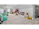Spacious bonus room with ample storage, play area, and neutral carpet, ideal for recreation and relaxation at 3915 Chevlot Hills Rd, Sherrills Ford, NC 28673