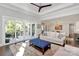 Bright living room with hardwood floors, large windows, and seamless access to an outdoor deck at 3915 Chevlot Hills Rd, Sherrills Ford, NC 28673