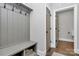 Mudroom featuring a bench, hooks, storage, and convenient access to other areas of the home at 3915 Chevlot Hills Rd, Sherrills Ford, NC 28673