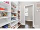 Walk-in pantry with abundant shelving for organized storage of food and household items at 3915 Chevlot Hills Rd, Sherrills Ford, NC 28673