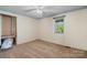 Carpeted bedroom with window and ceiling fan at 4067 Old Buff Rd, Hickory, NC 28602