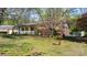 Charming brick home with a welcoming front porch and attached two-car garage at 4067 Old Buff Rd, Hickory, NC 28602