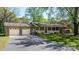 Charming brick home with a welcoming front porch and attached two-car garage at 4067 Old Buff Rd, Hickory, NC 28602