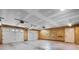 Spacious three car garage with wood paneling at 4067 Old Buff Rd, Hickory, NC 28602