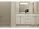 Bright bathroom featuring a double sink vanity with white cabinets and contemporary fixtures at 4115 Camden Glen Rd, Lancaster, SC 29720