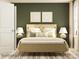 Serene bedroom featuring a stylish bed, dark green accent wall, decorative lamps, and soft natural light from the window at 4115 Camden Glen Rd, Lancaster, SC 29720