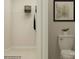 Functional closet space with organized shelving and storage baskets above the toilet at 4115 Camden Glen Rd, Lancaster, SC 29720