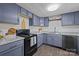 Well-lit kitchen with modern countertops, ample cabinet space, and updated appliances at 4436 Shiloh Unity Rd, Lancaster, SC 29720