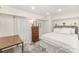 Comfortable bedroom showcasing a queen-size bed, wood floors, and dresser at 45 Mckinnon Ne Ave, Concord, NC 28025
