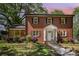 Charming brick home featuring a well-manicured lawn and an inviting entrance at 45 Mckinnon Ne Ave, Concord, NC 28025