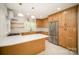 Bright, renovated kitchen with custom cabinetry, quartz countertops and stainless appliances at 45 Mckinnon Ne Ave, Concord, NC 28025