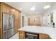 Stylish eat-in kitchen with stainless appliances and an adjacent living area at 45 Mckinnon Ne Ave, Concord, NC 28025
