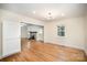 Bright living room with hardwood floors, fireplace, and an open layout at 45 Mckinnon Ne Ave, Concord, NC 28025