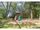 Backyard including a ' playset with slide, swing, and room to climb at 45 Mckinnon Ne Ave, Concord, NC 28025