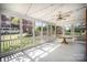 This porch has an outdoor ceiling fan, white railings, and an outdoor table at 45 Mckinnon Ne Ave, Concord, NC 28025
