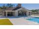 Inviting community pool and outdoor clubhouse, perfect for recreation and socializing at 4813 Reason Ct # 75, Harrisburg, NC 28075