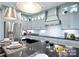 Modern kitchen with stainless steel appliances, dark countertops, and ample cabinet space at 4813 Reason Ct # 75, Harrisburg, NC 28075