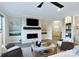 Cozy living room with a fireplace, stylish decor, and comfortable seating at 4813 Reason Ct # 75, Harrisburg, NC 28075