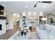 Inviting living room with fireplace, recessed lighting, and an open layout to other living spaces at 4813 Reason Ct # 75, Harrisburg, NC 28075