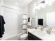 Neutral bathroom with tub and shower combination, tiled walls, modern fixtures, and decor at 4825 Reason Ct # 73, Harrisburg, NC 28075