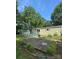 Exterior view of home featuring a spacious backyard, detached shed, and rear deck at 5029 E Nc 10 Hwy Rd # 6, Catawba, NC 28609