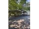 Spacious double carport with adjacent shed, providing ample sheltered parking and storage on a paved driveway at 5029 E Nc 10 Hwy Rd # 6, Catawba, NC 28609