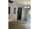 Bright dining room features wood-look floors, decorative lighting, and access to a kitchen and patio at 5029 E Nc 10 Hwy Rd # 6, Catawba, NC 28609
