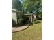 Charming single-story home with a covered front porch and an American flag in a lush, green yard at 5029 E Nc 10 Hwy Rd # 6, Catawba, NC 28609