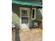 Cozy entryway with chairs, decorative pillows, and a view of the home's green exterior at 5029 E Nc 10 Hwy Rd # 6, Catawba, NC 28609