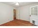 Bedroom with hardwood flooring and white walls featuring hallway access at 516 Northgate Ave, Charlotte, NC 28209