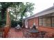 Outdoor deck area featuring table and chairs perfect for entertaining or relaxing at 516 Northgate Ave, Charlotte, NC 28209