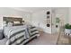 Nicely decorated bedroom with a closet and open doorway to another room at 545 Morrison Farm Rd, Troutman, NC 28166