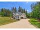 Long driveway leading to a well-maintained home with an attached garage and verdant surroundings at 545 Morrison Farm Rd, Troutman, NC 28166