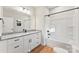 Bright bathroom features a granite countertop and white cabinets, with a tub and shower combination at 551 Belfast Dr, Gastonia, NC 28052