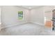 Inviting bedroom with a window view and closet providing storage solutions at 551 Belfast Dr, Gastonia, NC 28052