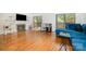 Inviting living room features hardwood floors, a fireplace, and sliding doors to the outside at 5807 Sharon Rd # A, Charlotte, NC 28210