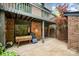 Outdoor brick patio offers space for lounging with garden views, providing a private outdoor retreat at 5807 Sharon Rd # A, Charlotte, NC 28210