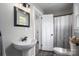 Bathroom with neutral paint, vanity, toilet, and tub/shower combo at 601 Whisnant St, Shelby, NC 28150